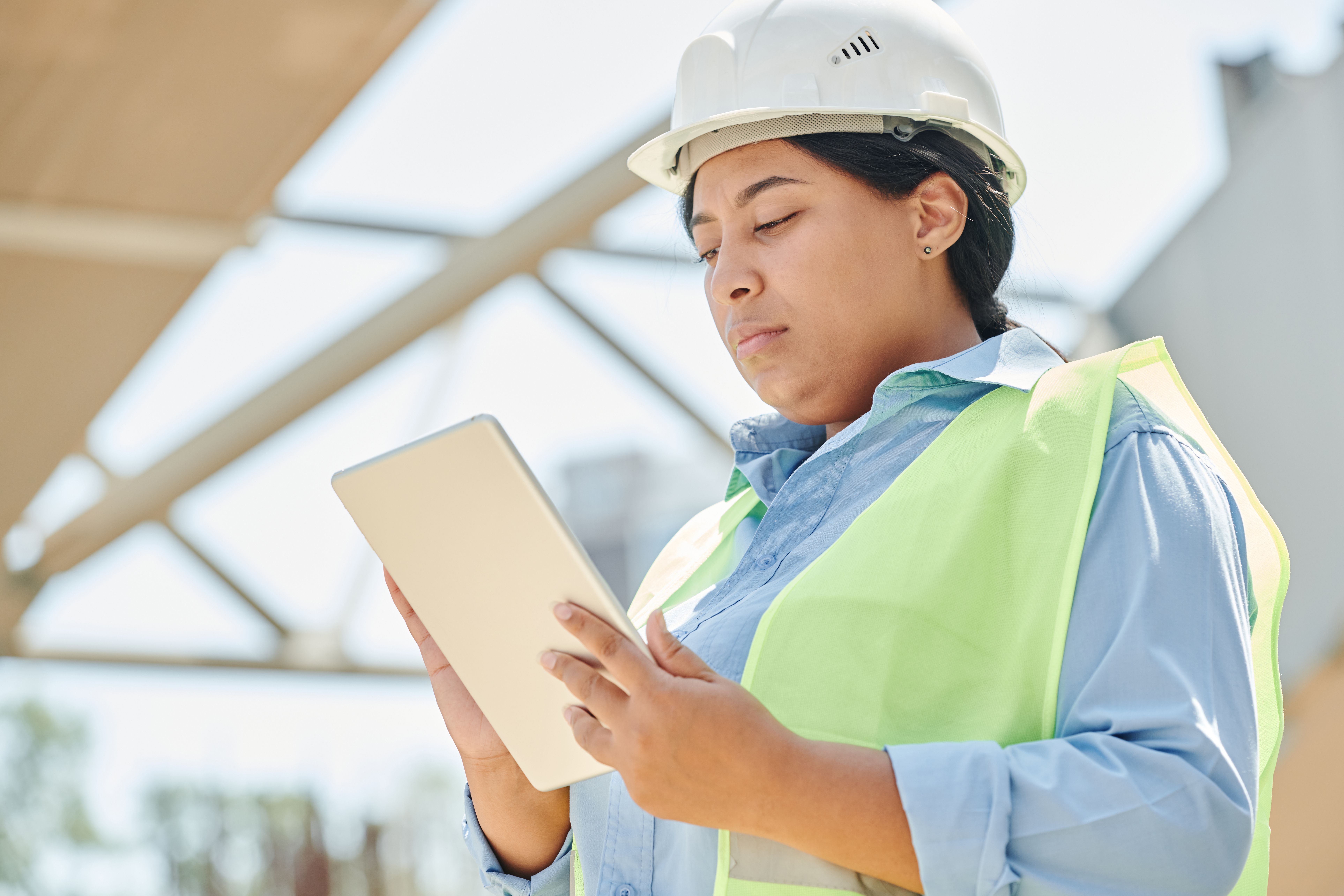 Field technician reviewing a job on a tablet
